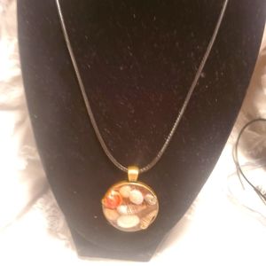 Handmade resin pendant with sea shells